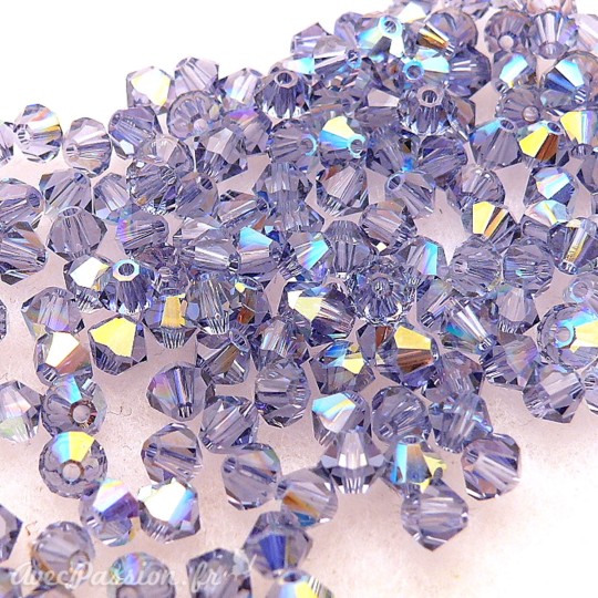 perle toupie swarovski 2X qu:50 4mm tanzanite perle toupie swarovski 2X qu:50 4mm tanzanite